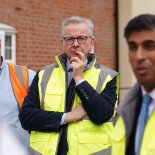 Article thumbnail: Britain's Levelling Up, Communities and Housing Secretary Michael Gove (C) and Britain's Prime Minister Rishi Sunak (R) visits the Taylor Wimpey Heather Gardens housing development in Norwich on August 29, 2023. (Photo by Joe Giddens / POOL / AFP) (Photo by JOE GIDDENS/POOL/AFP via Getty Images)