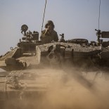 Article thumbnail: KIBBUTZ BAR'AM, ISRAEL - OCTOBER 14: Israel continues to deploy soldiers, tanks and armored vehicles near the Gaza border in Kibbutz Bar'am, Israel on October 14, 2023. (Photo by Mostafa Alkharouf/Anadolu via Getty Images)