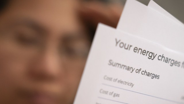 Article thumbnail: File photo dated 08/01/22 of a person holding an energy bill. More than three million people have cut back on their spending as a result of energy bills in the past year, analysis suggests. The analysis by Citizens Advice Scotland (CAS) of research from polling company YouGov also shows more than a million people have cut back their spending significantly in response to rising costs. Issue date: Sunday December 3, 2023. PA Photo. The charity is running a campaign called "Worried this winter", which encourages members of the public struggling with their bills to seek advice from the network. See PA story SCOTLAND Energy. Photo credit should read: Danny Lawson/PA Wire