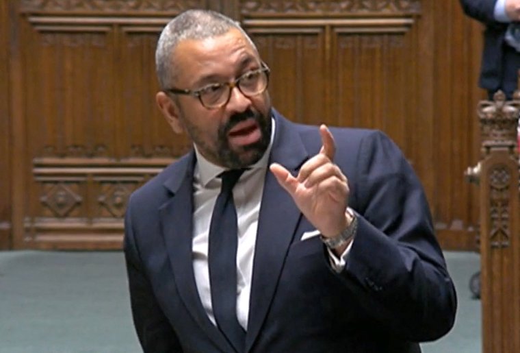 A video grab from footage broadcast by the UK Parliament's Parliamentary Recording Unit (PRU) shows Britain's Home Secretary James Cleverly opening the Safety of Rwanda (Asylum and Immigration) Bill: 2nd reading, in the House of Commons, in London on December 12, 2023. UK Prime Minister Rishi Sunak on Tuesday seeks to avoid a humiliating defeat for his latest plans to send migrants to Rwanda that have split his ruling Conservative party. The Safety of Rwanda (Asylum and Immigration) Bill is Sunak's answer to a unanimous Supreme Court ruling last month that deporting asylum seekers to Rwanda was illegal in international law. (Photo by PRU / AFP) / RESTRICTED TO EDITORIAL USE - MANDATORY CREDIT "AFP PHOTO / PRU " - NO MARKETING - NO ADVERTISING CAMPAIGNS - DISTRIBUTED AS A SERVICE TO CLIENTS (Photo by -/PRU/AFP via Getty Images)