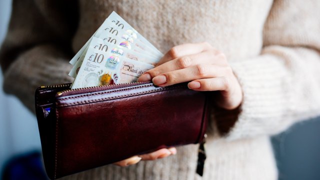 Article thumbnail: Woman Holding British Pound