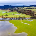 Article thumbnail: The view from a drone of agricultural fields flooded by heavy rain the location is Dumfries and Galloway south west Scotland