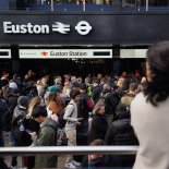 Article thumbnail: Passengers at Euston Station, London, as travellers get an early start to their Christmas journeys ahead of the weekend. Strong winds are disrupting the start of the Christmas getaway for millions of people. Train services across large parts of Britain are being affected by Storm Pia as fallen trees and other debris damage overhead power lines and block tracks. Picture date: Thursday December 21, 2023. PA Photo. See PA story TRANSPORT Getaway. Photo credit should read: James Manning/PA Wire
